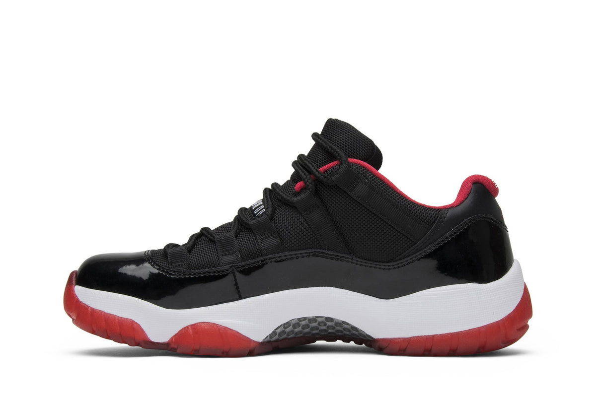 Retro 11 Low Sneakers — Bred — 528895-012