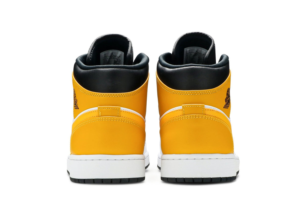 Retro 1 Mid Sneakers — University Gold — 554724-170
