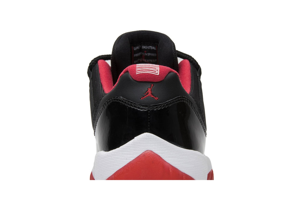 Retro 11 Low Sneakers — Bred — 528895-012