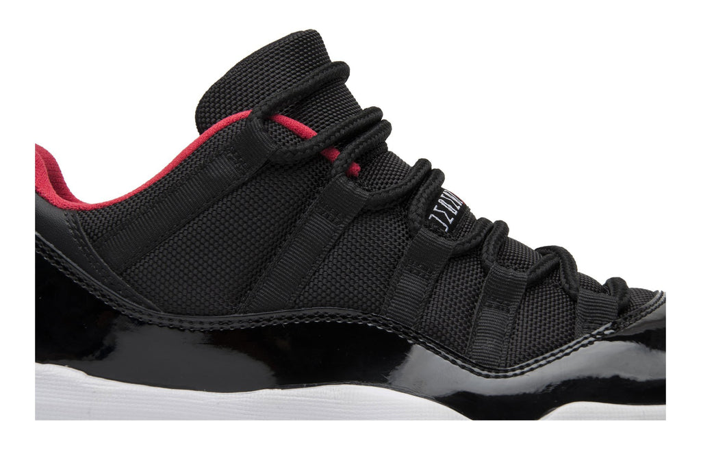Retro 11 Low Sneakers — Bred — 528895-012