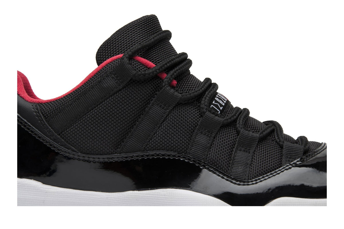 Retro 11 Low Sneakers — Bred — 528895-012