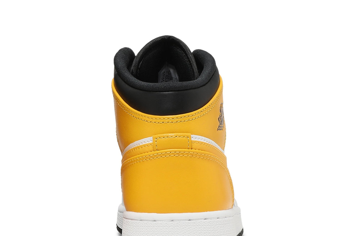 Retro 1 Mid GS Sneakers — University Gold — 554725-170