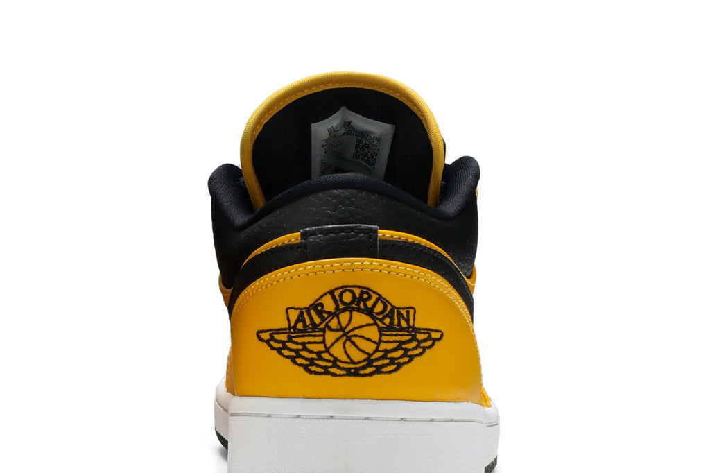 Retro 1 Low Sneakers — University Gold Black — 553558-700