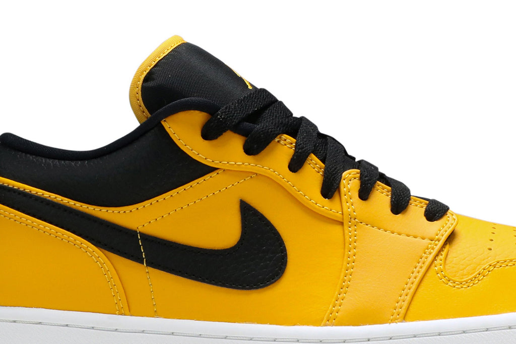 Retro 1 Low Sneakers — University Gold Black — 553558-700