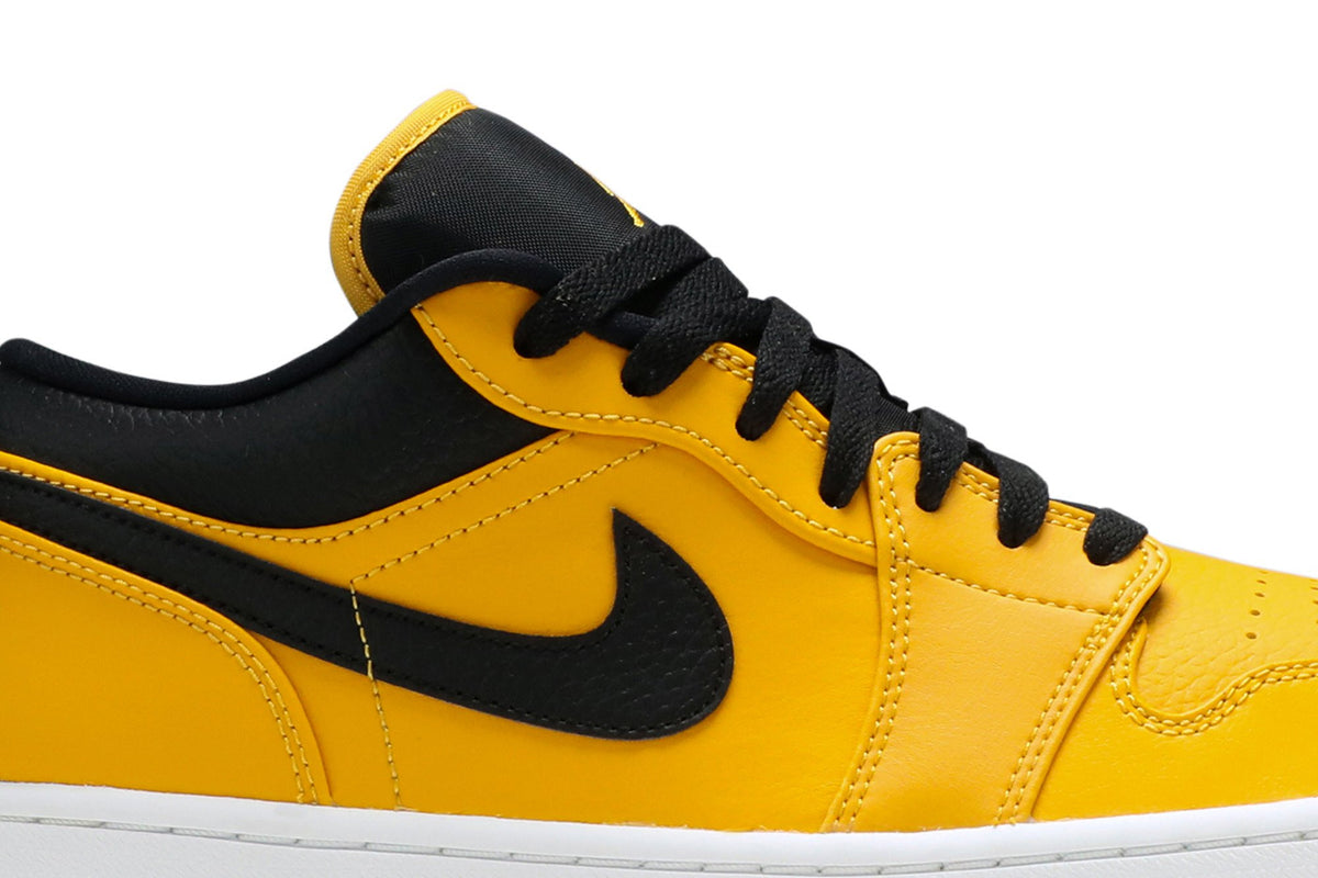 Retro 1 Low Sneakers — University Gold Black — 553558-700